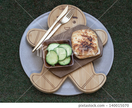 This ensemble elevates the morning ritual into a sensory experience. At its center is an artisanal ham and cheese toastie, charred to a smoky mahogany and bubbling with molten gold. Crisp radish This ensemble elevates the morning ritual into a sensory experience. At its center is an artisanal ham and cheese toastie, charred to a smoky mahogany and bubbling with molten gold. Crisp radish 140015070