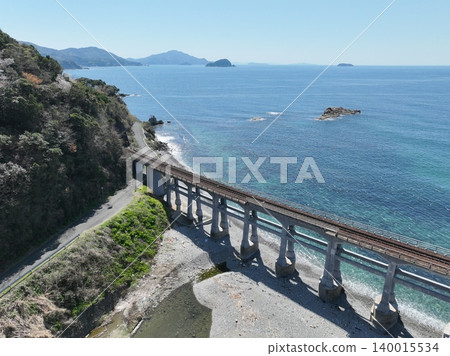 Sōgōgawa Bridge, a reinforced concrete bridge along the Sea of Japan coast, aerial footage, San'in Main Line Sōgōgawa Bridge, a reinforced concrete bridge along the Sea of Japan coast, aerial footage, San'in Main Line 140015534