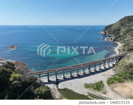 Sōgōgawa Bridge, a reinforced concrete bridge along the Sea of Japan coast, aerial footage, San'in Main Line Sōgōgawa Bridge, a reinforced concrete bridge along the Sea of Japan coast, aerial footage, San'in Main Line 140015535