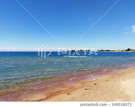 Lake Issyk-Kul and the Tian Shan Mountains Lake Issyk-Kul and the Tian Shan Mountains 140016071
