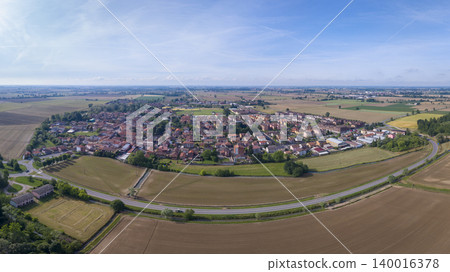 Aerial view of Giussago a small town in the province of Pavia at sunny day Aerial view of Giussago a small town in the province of Pavia at sunny day 140016378