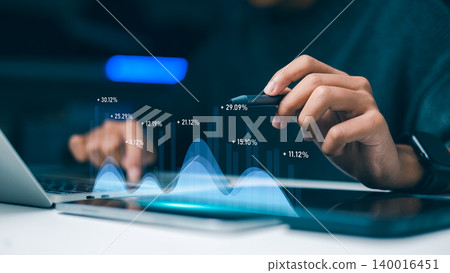Businessman Hand using Stylus Pointing at Financial Growth Graph Interface on Tablet Businessman Hand using Stylus Pointing at Financial Growth Graph Interface on Tablet 140016451