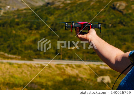 Start the drone, launching from hand Start the drone, launching from hand 140016799