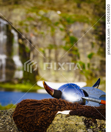 Viking helmet on lake shore, Norway 140016800