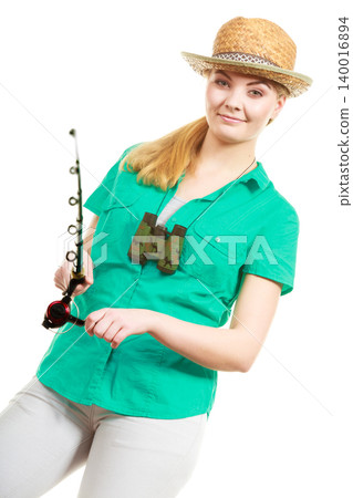 Woman with fishing rod, spinning equipment Woman with fishing rod, spinning equipment 140016894