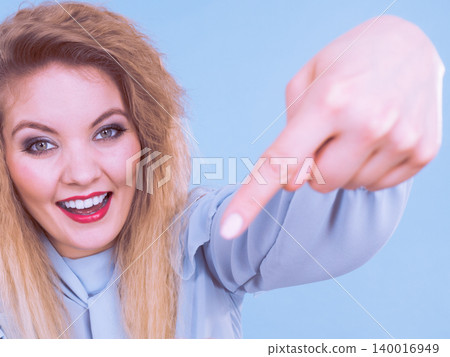 Woman pointing at herself 140016949