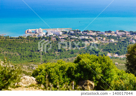 Mediterranean coast view with Alcossebre seaside village, Spain Mediterranean coast view with Alcossebre seaside village, Spain 140017044