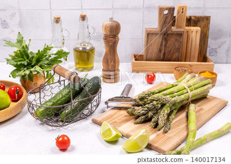 Preparing fresh vegetables and ingredients for healthy cooking 140017134