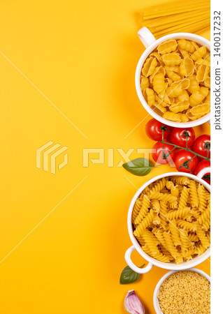 Various italian pasta types and ingredients flat lay Various italian pasta types and ingredients flat lay 140017232