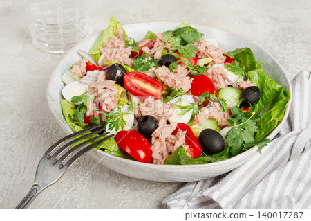 salad with canned tuna, vegetable salad with quail eggs, lettuce and romaine leaves, red onion, cherry tomatoes, olives, keto food, healthy eating, salad with canned tuna, vegetable salad with quail eggs, lettuce and romaine leaves, red onion, cherry tomatoes, olives, keto food, healthy eating, 140017287