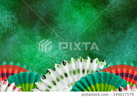 Mexican Fiesta Background with Colorful Paper Fans Mexican Fiesta Background with Colorful Paper Fans 140017579