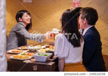 A young woman who was excited at a drinking party A young woman who was excited at a drinking party 140018106