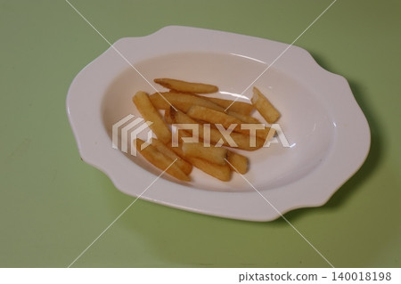 French Fries on White Plate French Fries on White Plate 140018198