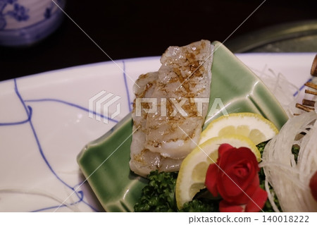 Grilled Fish with Lemon and Garnish on Plate Grilled Fish with Lemon and Garnish on Plate 140018222