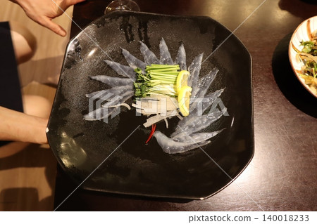 Sashimi Platter with Lemon and Garnishes Sashimi Platter with Lemon and Garnishes 140018233