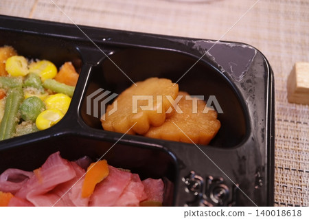 Close-up of a bento box with assorted food items 140018618