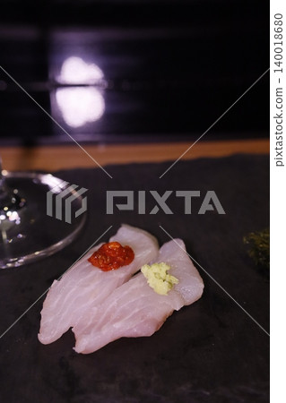 Sashimi with Garnishes on Dark Plate Sashimi with Garnishes on Dark Plate 140018680