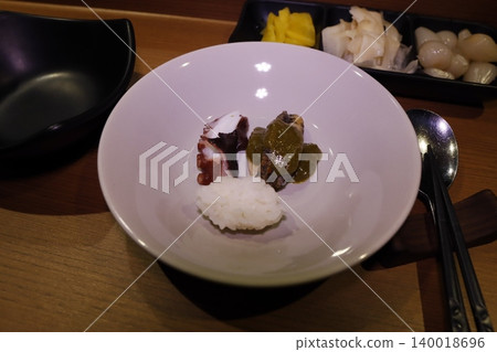 Japanese Seafood Dish with Octopus and Rice 140018696