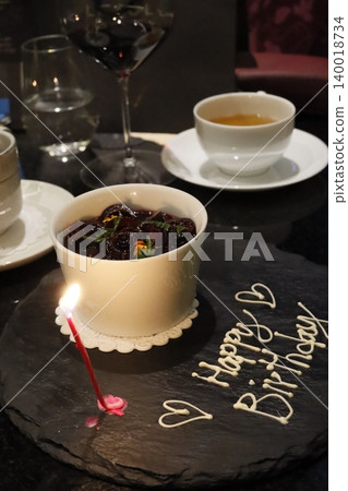 Birthday Dessert with Candle and 'Happy Birthday' Message 140018734