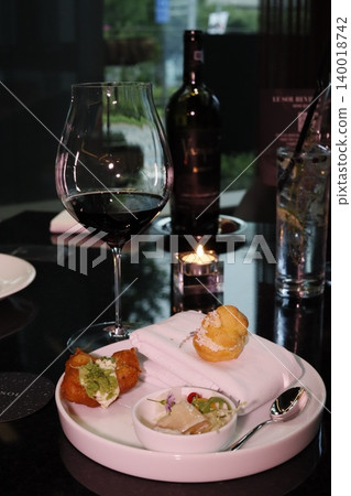 Gourmet Plate with Wine and Appetizers 140018742