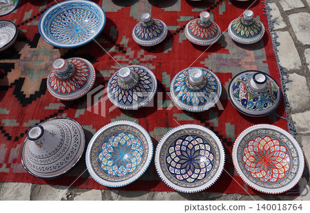 Traditional clay plates on the market of Tunisia. Traditional clay plates on the market of Tunisia. 140018764