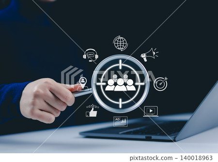 Digital marketing and target audience concept. Magnifying glass over a digital interface with marketing and customer targeting icons, audience analysis, online advertising, and business strategy. AD, 140018963