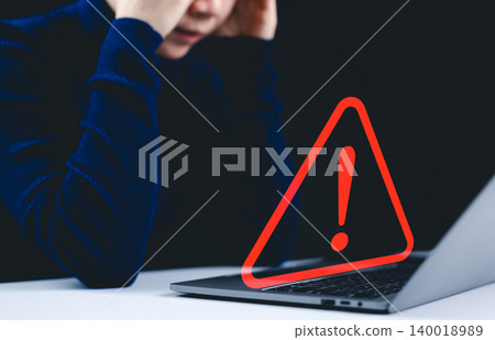 Warning alert system concept. A woman working on the computer, hacked on the computer network, crime and virus, Malicious software, compromised information, illegal connection, data vulnerability, 140018989