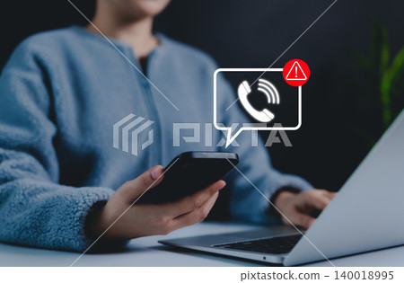 Phone scam alert notification concept. A person holding a smartphone with a digital scam warning notification, fraudulent calls, cybersecurity threats, and telecommunication security awareness. fraud, Phone scam alert notification concept. A person holding a smartphone with a digital scam warning notification, fraudulent calls, cybersecurity threats, and telecommunication security awareness. fraud, 140018995