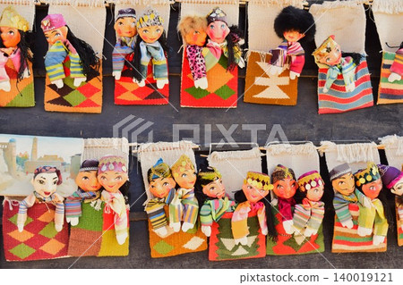 Uzbek dolls lined up in the bazaar of Khiva Uzbek dolls lined up in the bazaar of Khiva 140019121