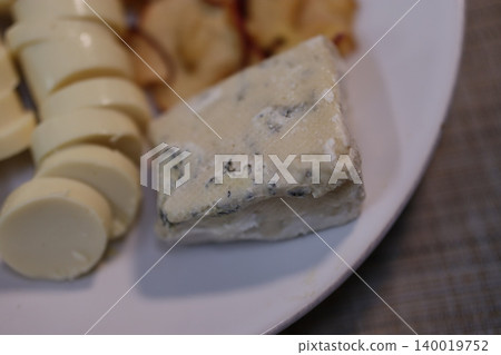 Cheese Plate with Blue Cheese and Sliced Varieties 140019752