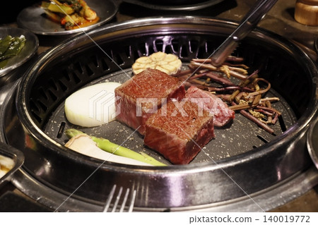 Korean BBQ Grill with Beef and Vegetables Korean BBQ Grill with Beef and Vegetables 140019772
