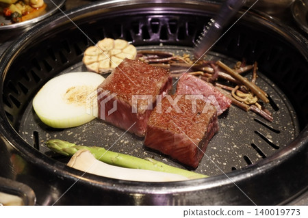 Grilled Steak and Vegetables on a Korean BBQ Grill Grilled Steak and Vegetables on a Korean BBQ Grill 140019773