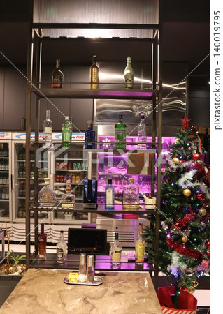 Modern Bar with Liquor Display and Christmas Decor Modern Bar with Liquor Display and Christmas Decor 140019795