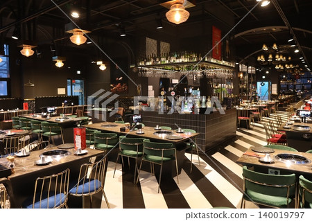 Modern Restaurant Interior with Black and White Striped Flooring Modern Restaurant Interior with Black and White Striped Flooring 140019797