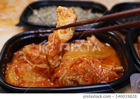 Spicy Chicken in Red Sauce with Chopsticks Spicy Chicken in Red Sauce with Chopsticks 140019828