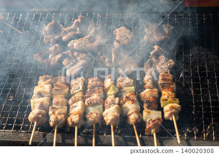 Grilled chicken on a grill Grilled chicken on a grill 140020308