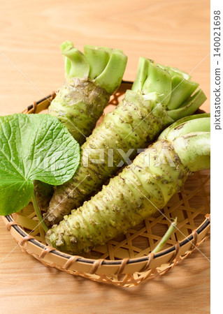 Fresh wasabi served in a basket Fresh wasabi served in a basket 140021698