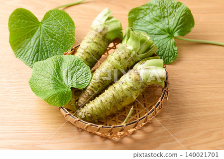 Fresh wasabi served in a basket Fresh wasabi served in a basket 140021701