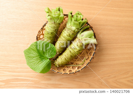 Fresh wasabi served in a basket Fresh wasabi served in a basket 140021706