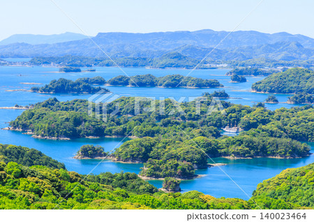 A view of the Kujukushima Islands from Kujukushima Tourist Park in early summer, Sasebo City, Nagasaki Prefecture. A view of the Kujukushima Islands from Kujukushima Tourist Park in early summer, Sasebo City, Nagasaki Prefecture. 140023464