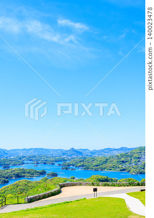 A view of the Kujukushima Islands from Kujukushima Tourist Park in early summer, Sasebo City, Nagasaki Prefecture. A view of the Kujukushima Islands from Kujukushima Tourist Park in early summer, Sasebo City, Nagasaki Prefecture. 140023478