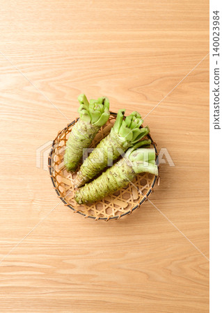 Fresh wasabi served in a basket Fresh wasabi served in a basket 140023984