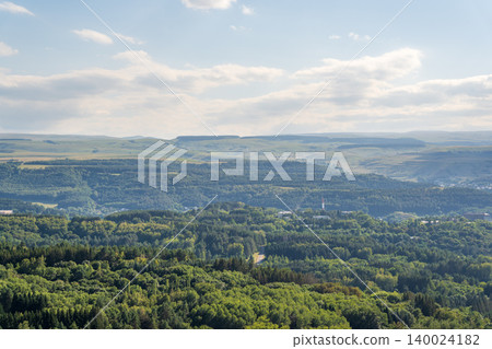 Layers of green mountains and hills in the haze during sunset. Panoramic View of Green hills and Meadow. Layers of green mountains and hills in the haze during sunset. Panoramic View of Green hills and Meadow. 140024182