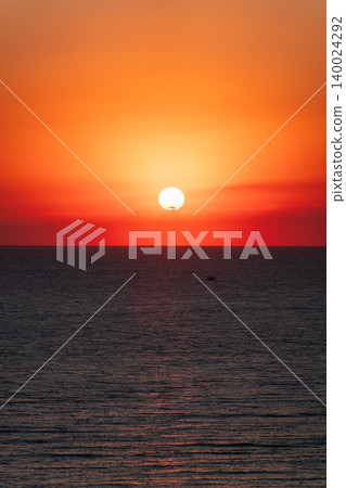 Beautiful red and orange sunrise over the sea. 140024292