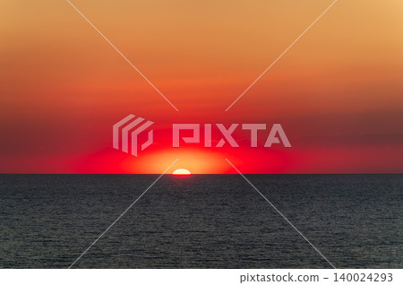 Beautiful red and orange sunrise over the sea. 140024293