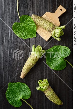 Fresh wasabi and wasabi leaves Fresh wasabi and wasabi leaves 140024824