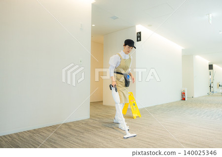 Middle-aged female cleaner Middle-aged female cleaner 140025346