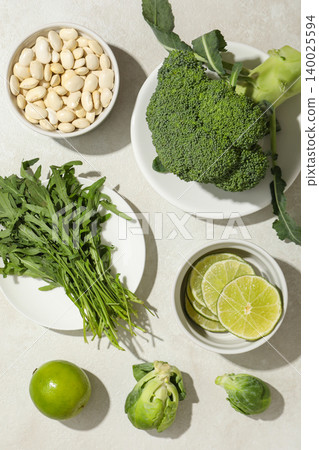 Fresh vegetables are displayed on a table for meal prep Fresh vegetables are displayed on a table for meal prep 140025594