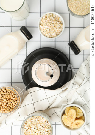 Different ingredients are arranged to make plant-based milk Different ingredients are arranged to make plant-based milk 140025612