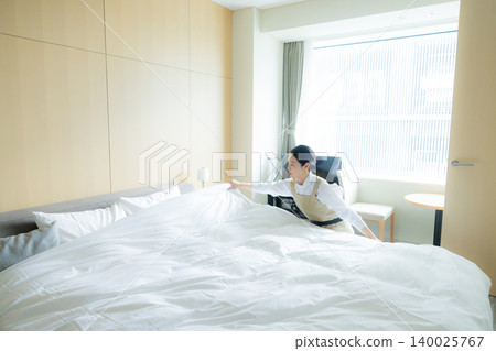 Middle-aged female cleaner Middle-aged female cleaner 140025767